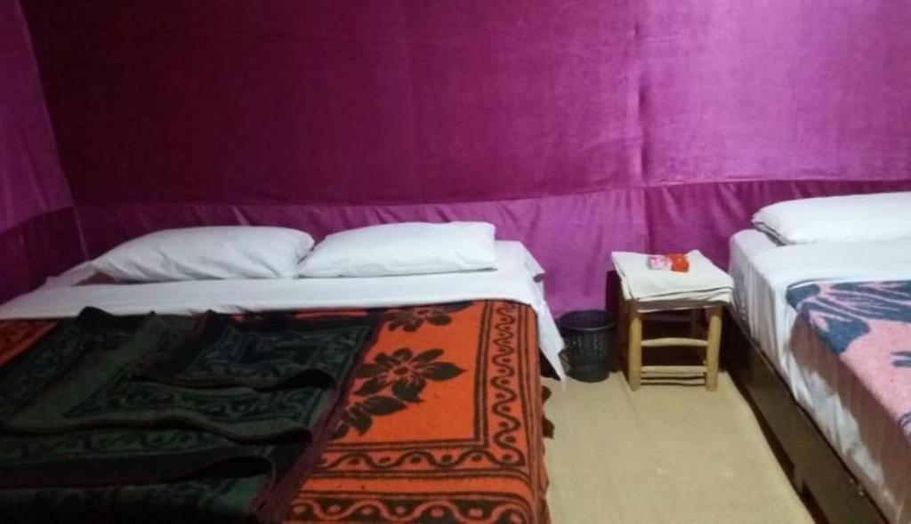 Postel nebo postele na pokoji v ubytování Nomad Bivouac