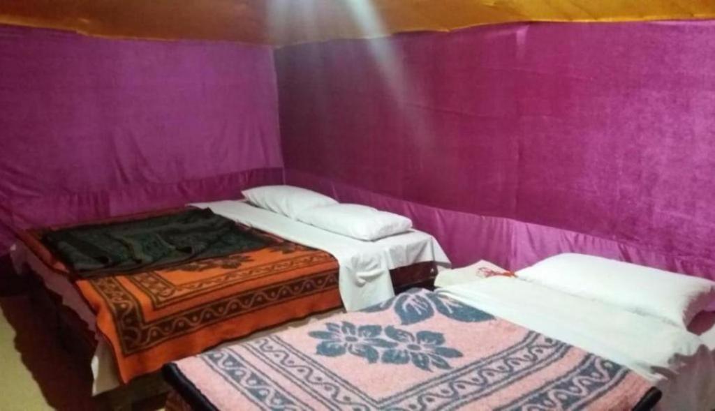 Postel nebo postele na pokoji v ubytování Nomad Bivouac