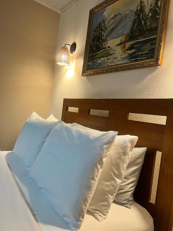 Postel nebo postele na pokoji v ubytování Cabana Drechsler Gramado