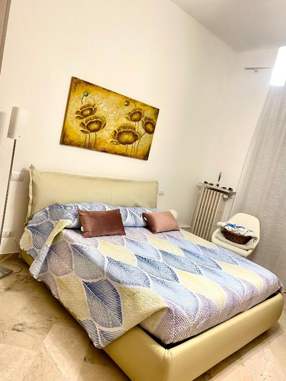 A bed or beds in a room at Suite Gaia