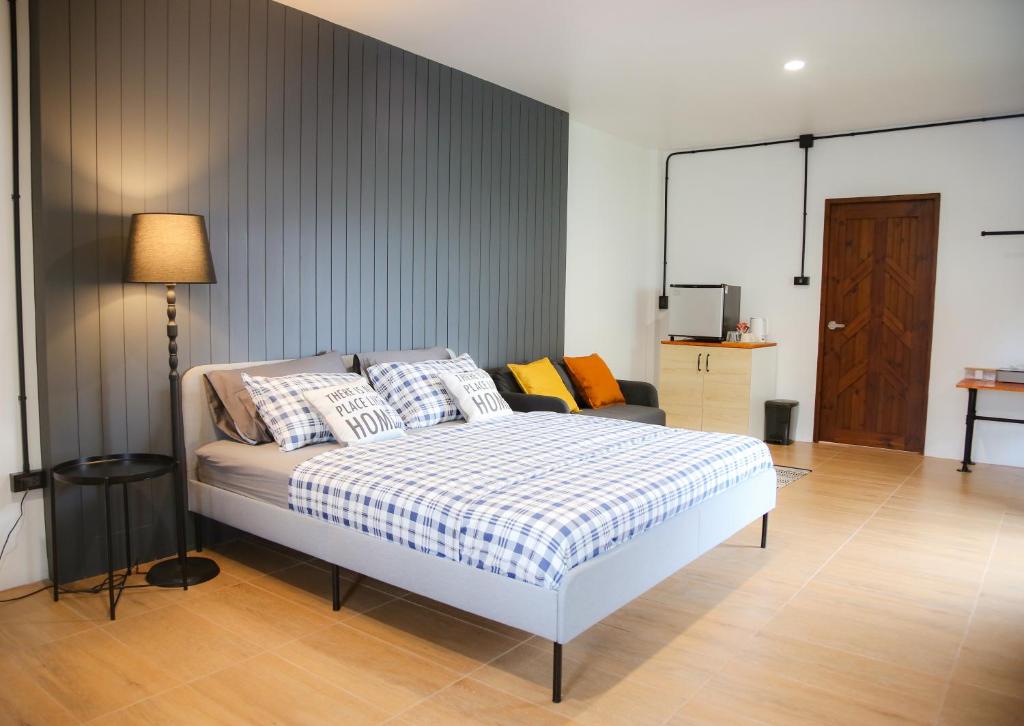 Postel nebo postele na pokoji v ubytování SLEEP SLEEP SUANPHAK Homestay
