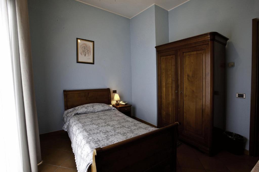 Postel nebo postele na pokoji v ubytování Hotel Nastro Azzurro