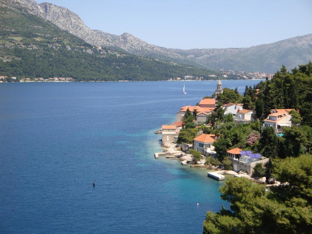 a small island in the middle of a large body of water at Apartment Rose in Korčula