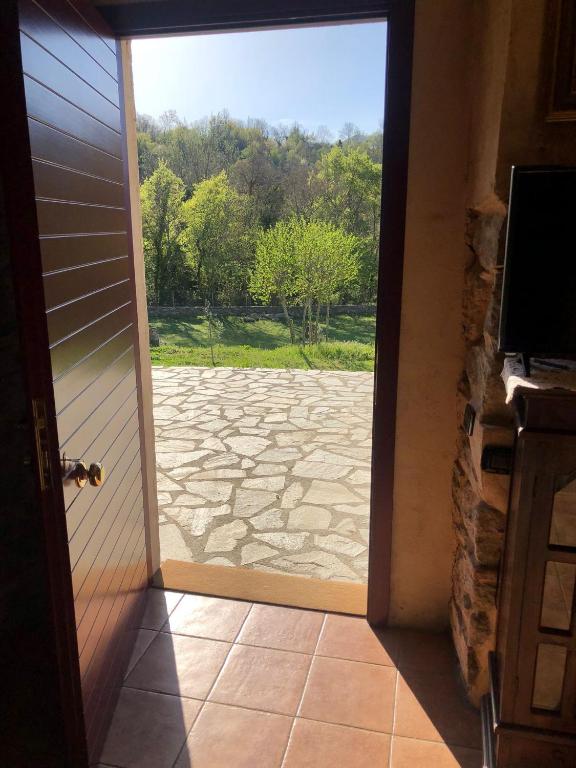 Televízia a/alebo spoločenská miestnosť v ubytovaní Agriturismo La Cascina dei Chicchi