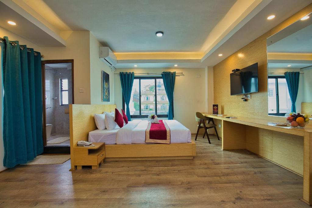 Postel nebo postele na pokoji v ubytování Hotel Grand View