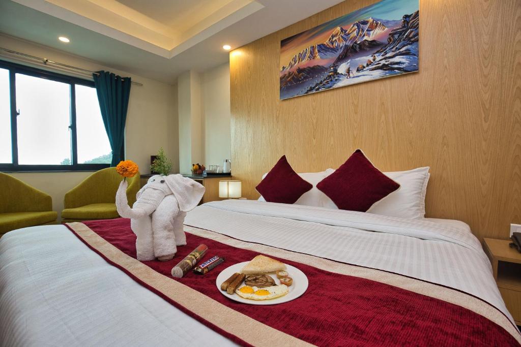 Postel nebo postele na pokoji v ubytování Hotel Grand View