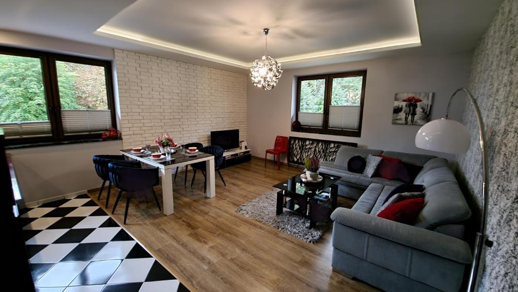 Posedenie v ubytovaní Jedynka Apartments