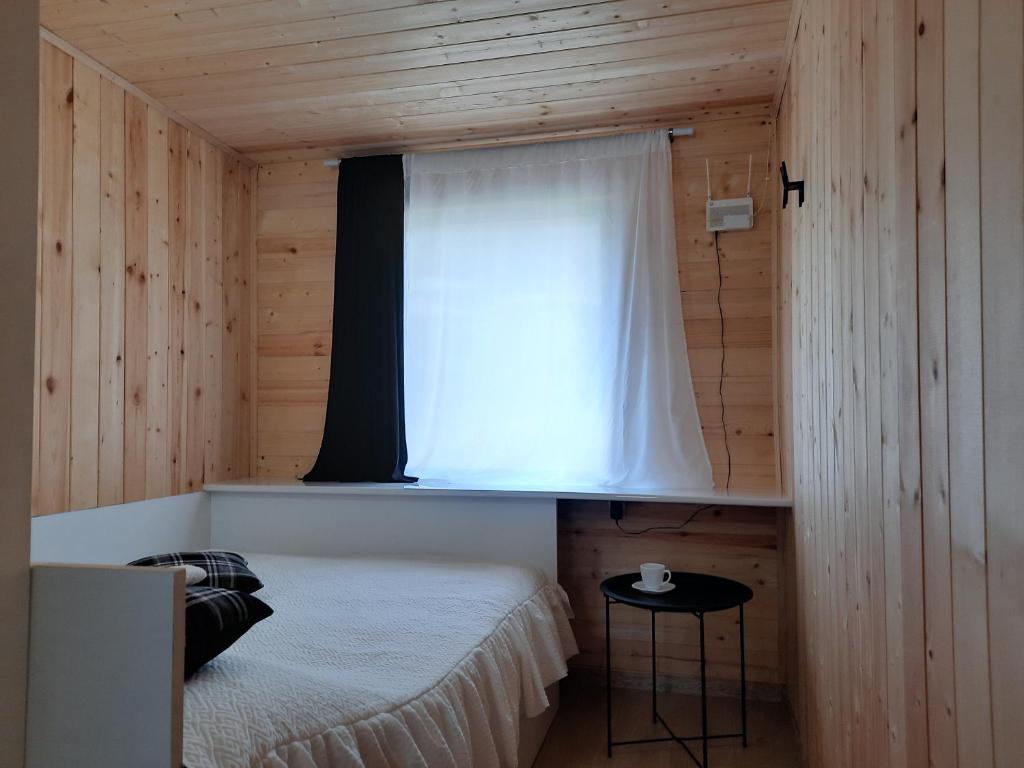 Voodi või voodid majutusasutuse Tiny House Kazbegi toas