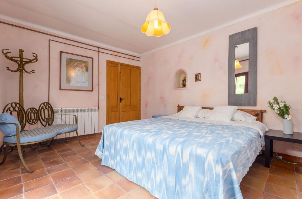 Postel nebo postele na pokoji v ubytování YourHouse Sa Cova