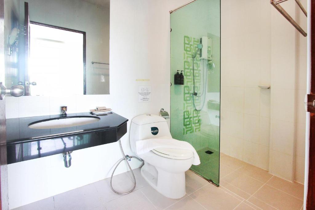 Koupelna v ubytování The Langstan Suites