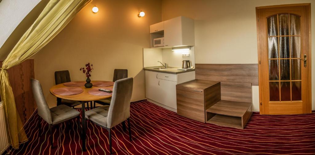 Kuchyň nebo kuchyňský kout v ubytování Hotel Brixen