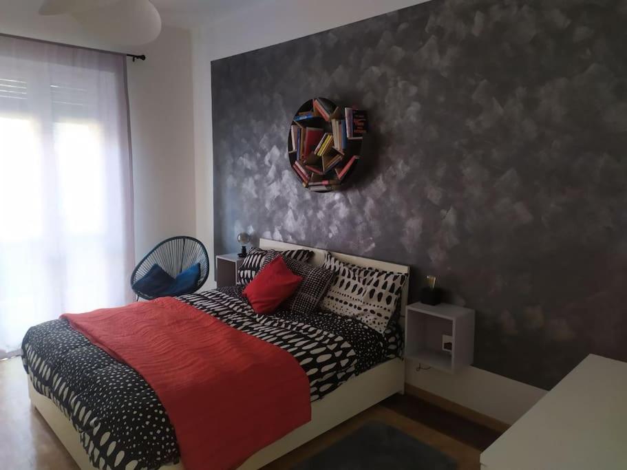 Postel nebo postele na pokoji v ubytování Appartamento Torino Inalpi Arena e Olimpico