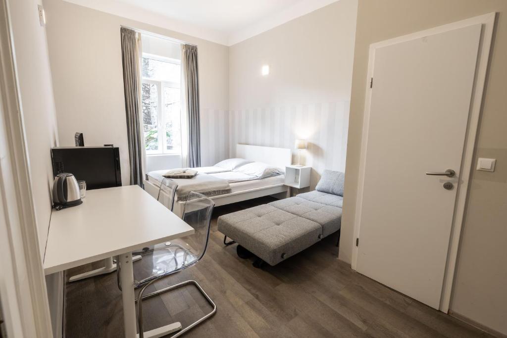 Postel nebo postele na pokoji v ubytování 4flats