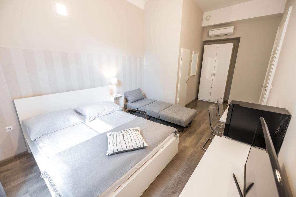 Postel nebo postele na pokoji v ubytování 4flats
