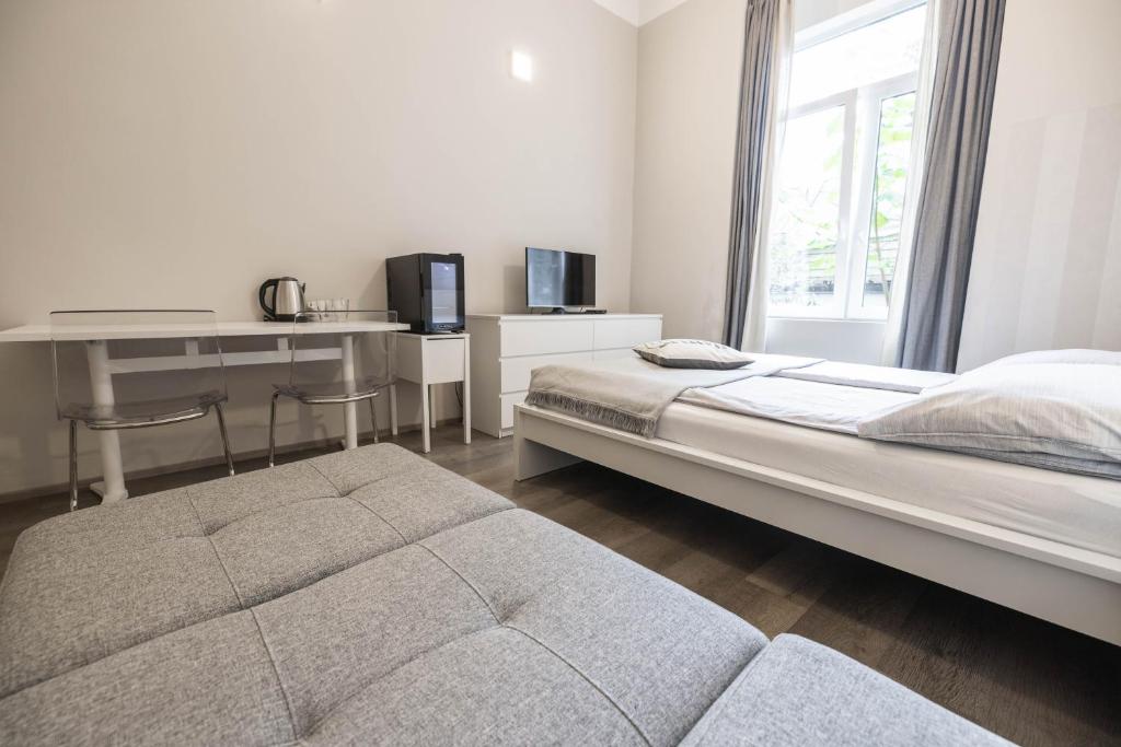 Postel nebo postele na pokoji v ubytování 4flats