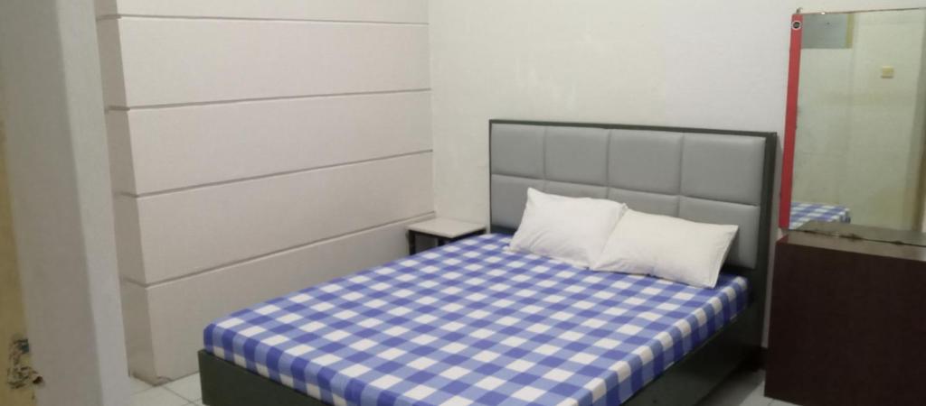 Letto o letti in una camera di HOTEL MAYA