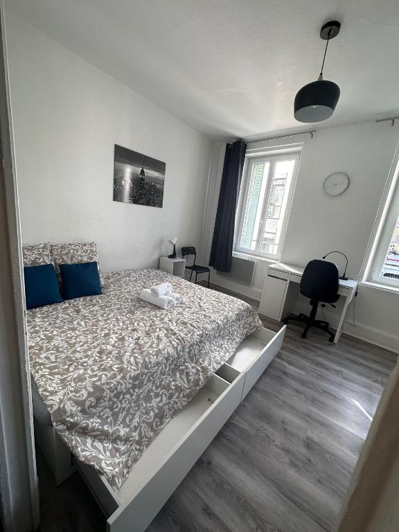 Posteľ alebo postele v izbe v ubytovaní Les Cosy De Nancy - L'alcove city trip 4 étoiles