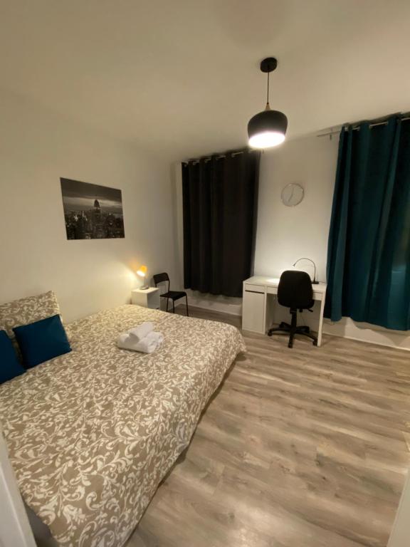 Posteľ alebo postele v izbe v ubytovaní Les Cosy De Nancy - L'alcove city trip 4 étoiles