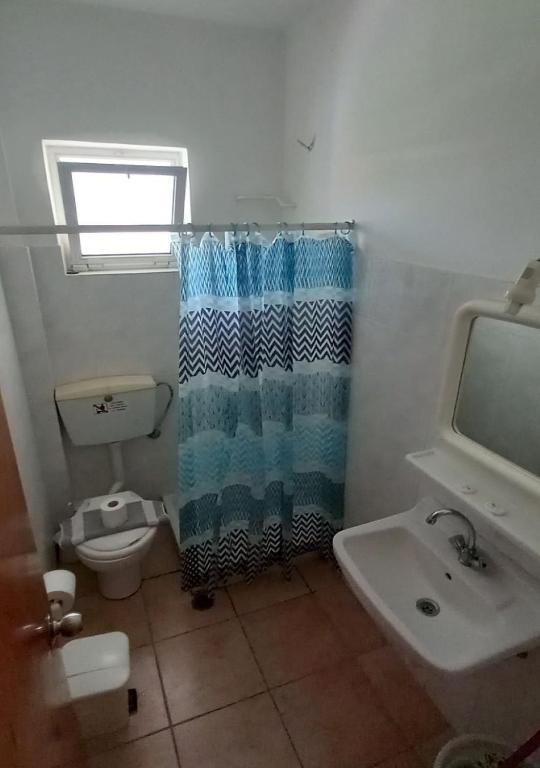 A bathroom at Glaros Studios