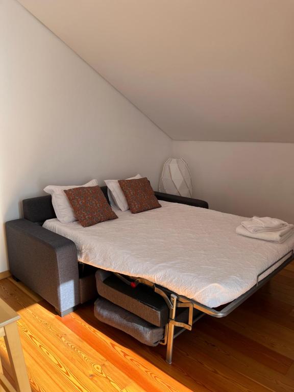 Postel nebo postele na pokoji v ubytování Casa dos Remedios