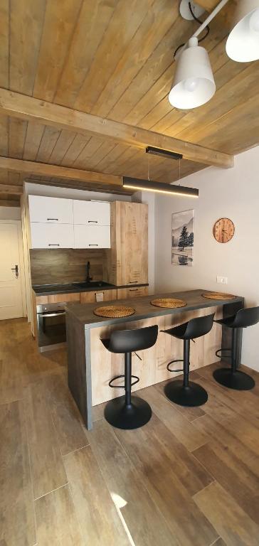 Kuchyňa alebo kuchynka v ubytovaní Moda Apartments Scalette