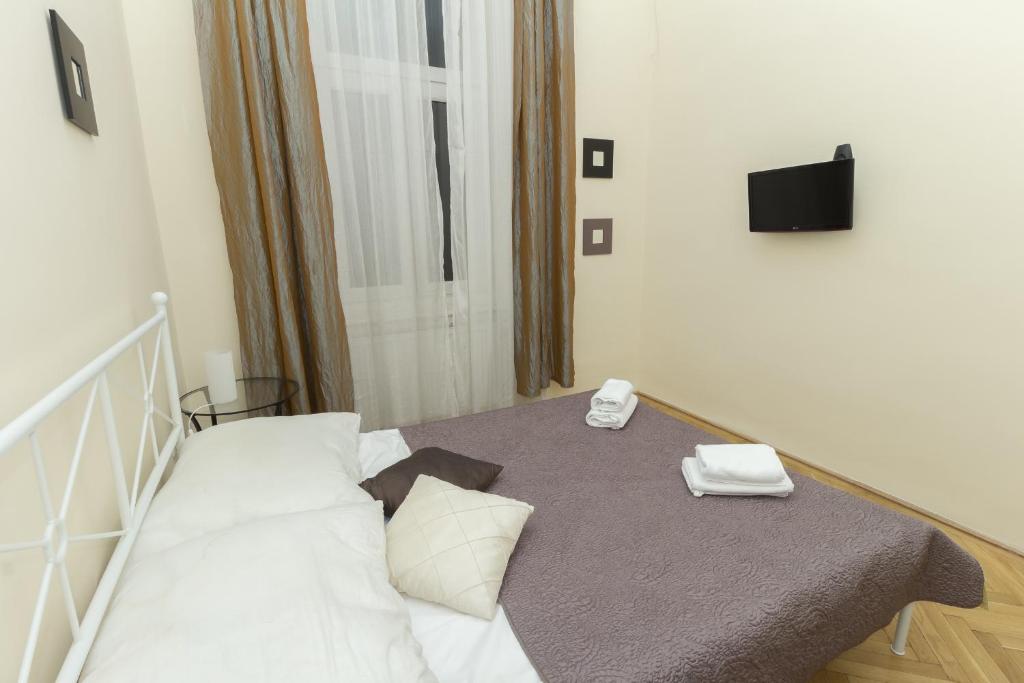Posteľ alebo postele v izbe v ubytovaní Budapest Bed and Breakfast