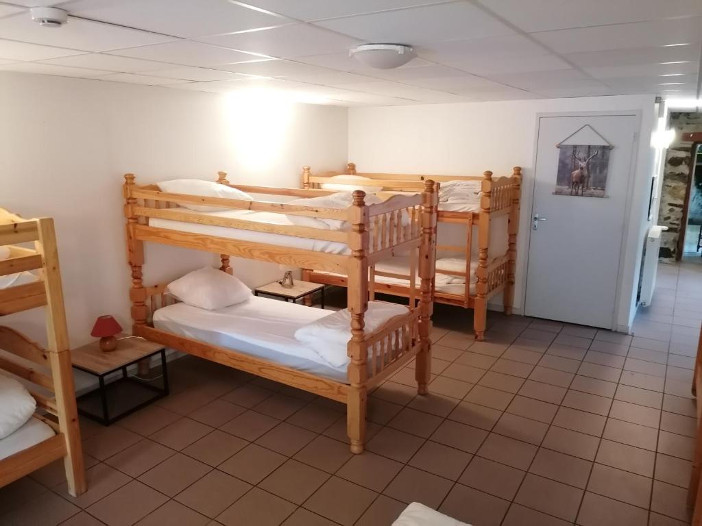 Postel nebo postele na pokoji v ubytování Auberge Chez Gabrielle - Vallée de Lesponne