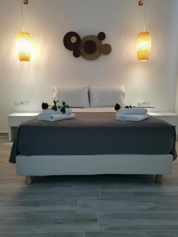 Postel nebo postele na pokoji v ubytování Galazio Rooms & Suites