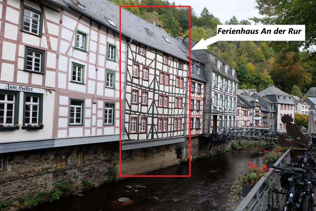 a bridge over a river in a town at An der Rur - 4 Apartments mitten in Monschau in Monschau