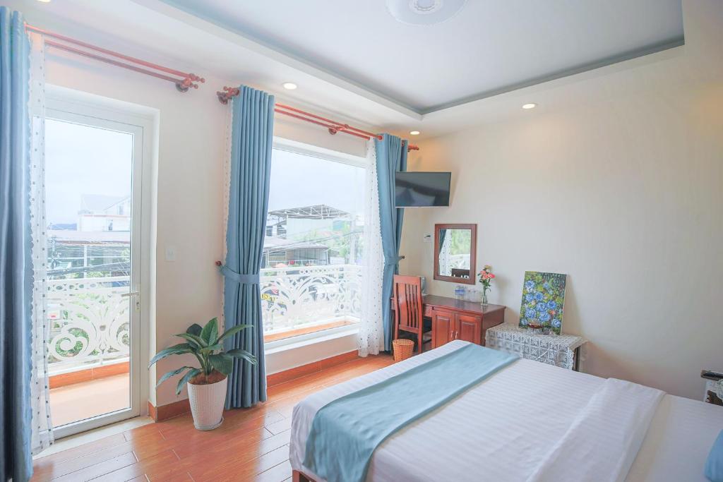 Giường trong phòng chung tại Rose Valley Hotel Da Lat Vietnam