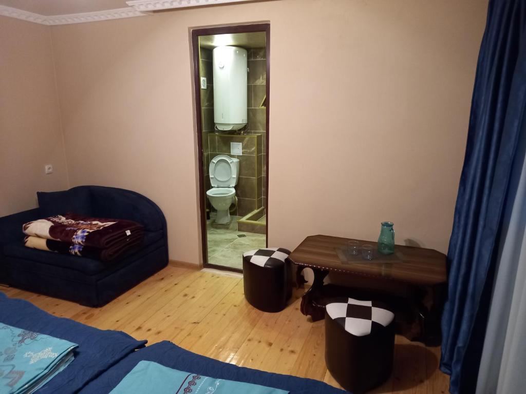 Postel nebo postele na pokoji v ubytování Spardishi tower
