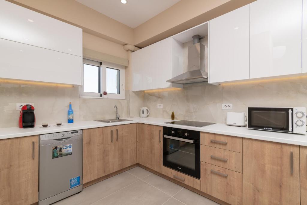 Kuchyňa alebo kuchynka v ubytovaní Spartakos Luxury Villa 4