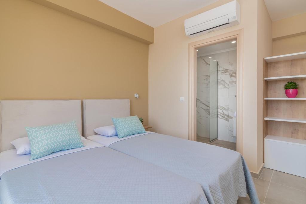 Posteľ alebo postele v izbe v ubytovaní Spartakos Luxury Villa 4