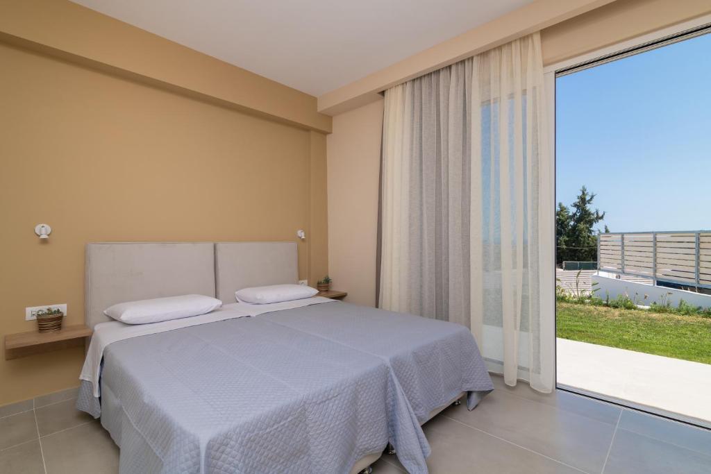 Posteľ alebo postele v izbe v ubytovaní Spartakos Luxury Villa 4