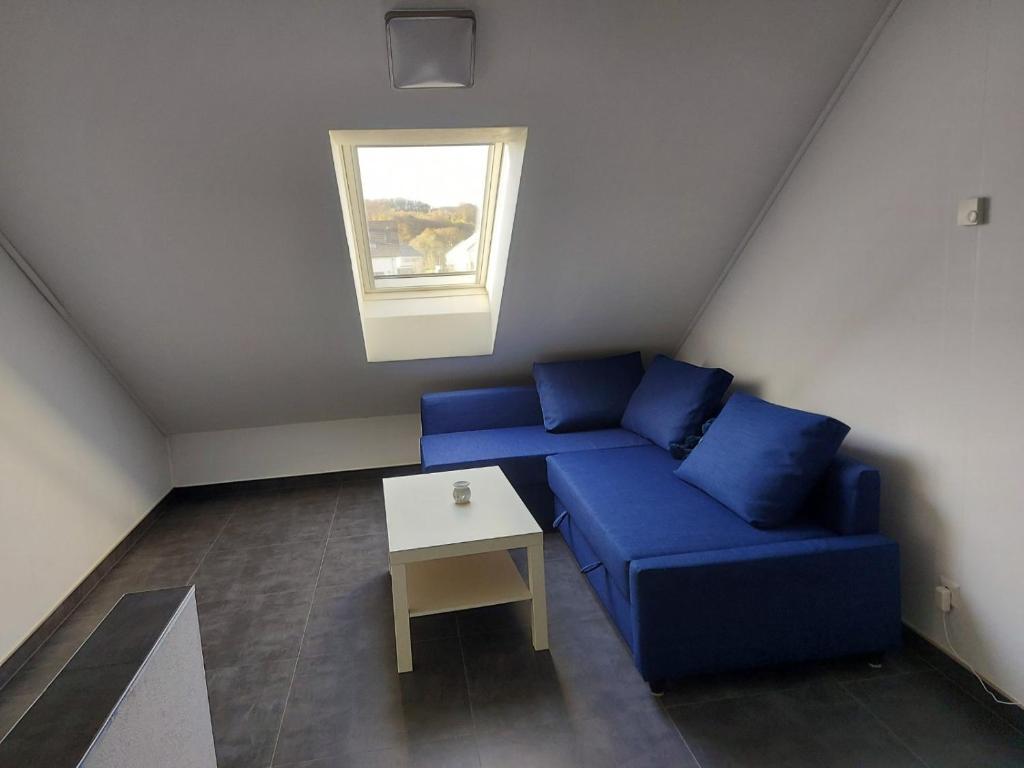 Posezení v ubytování Comfortable room with double bed