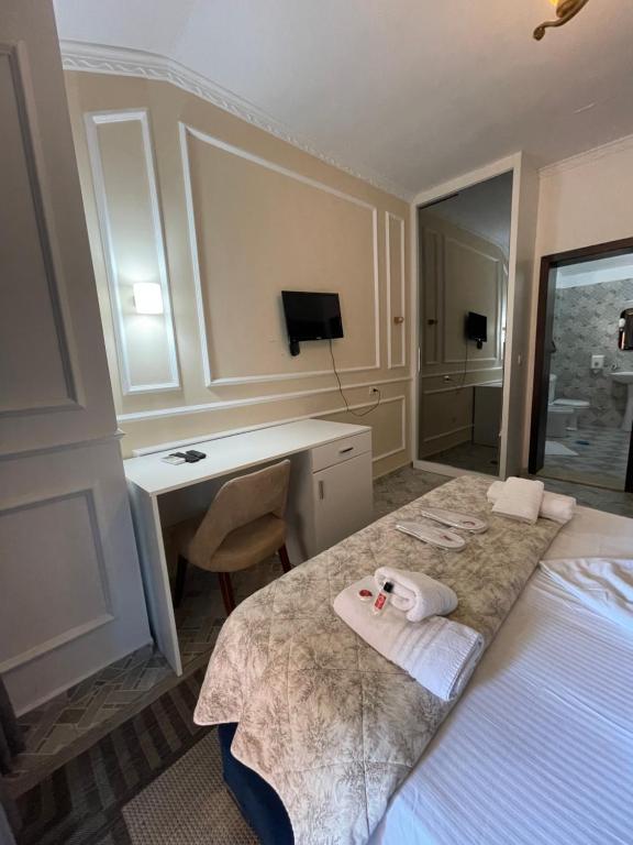 Postel nebo postele na pokoji v ubytování VILA SANREMO