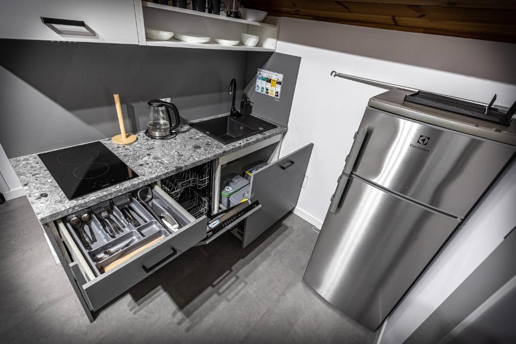 Kuchyňa alebo kuchynka v ubytovaní Apartamenty MIODZIO