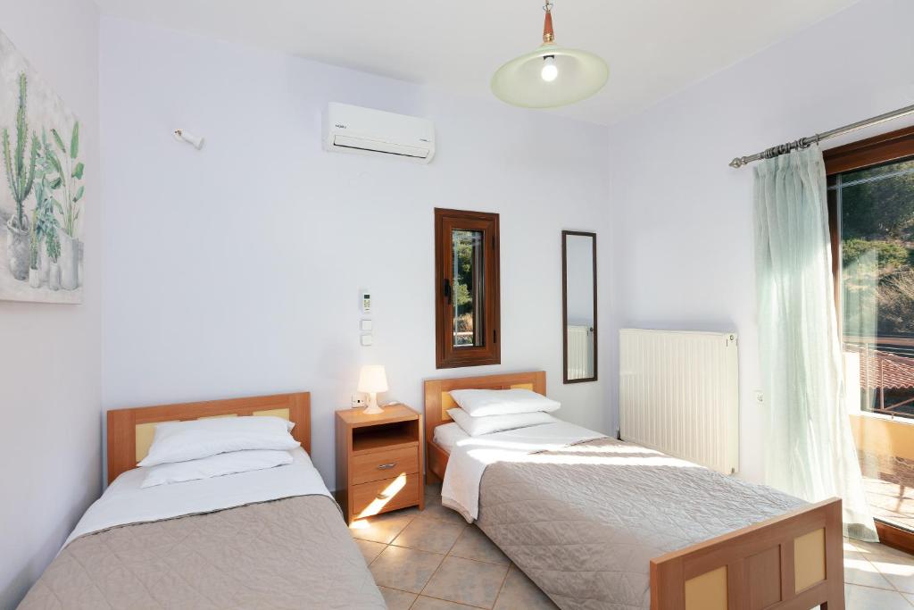 Posteľ alebo postele v izbe v ubytovaní Villa Sevdas
