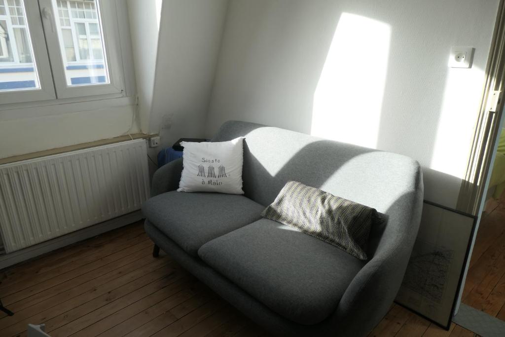 Posedenie v ubytovaní Appartement - Villa Léopold à Malo