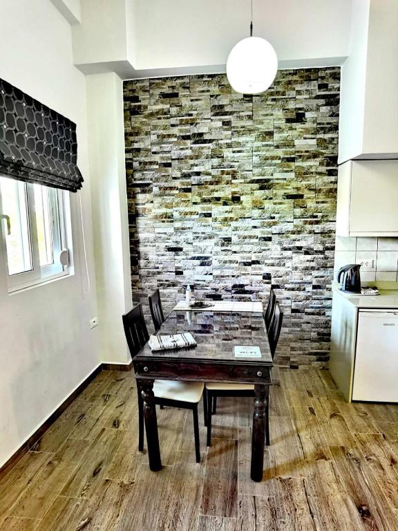 Kuchyň nebo kuchyňský kout v ubytování Vlycha Beach Apartments