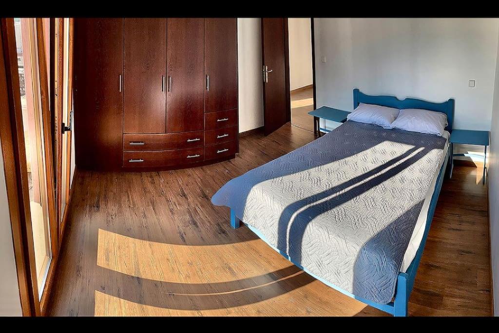 Postel nebo postele na pokoji v ubytování Persephone's Villa