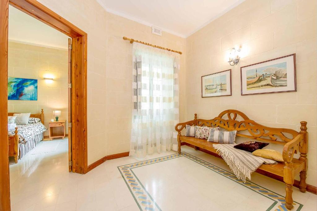 Postel nebo postele na pokoji v ubytování Djar Ta Menzja 3 Holiday Home