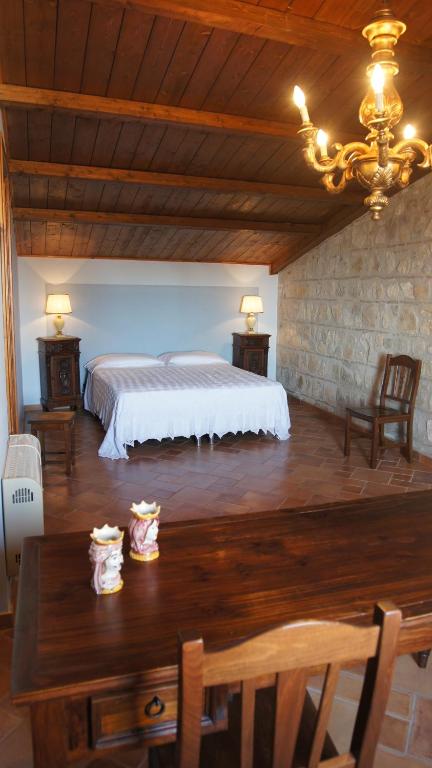 Postel nebo postele na pokoji v ubytování B&B Sciabakè