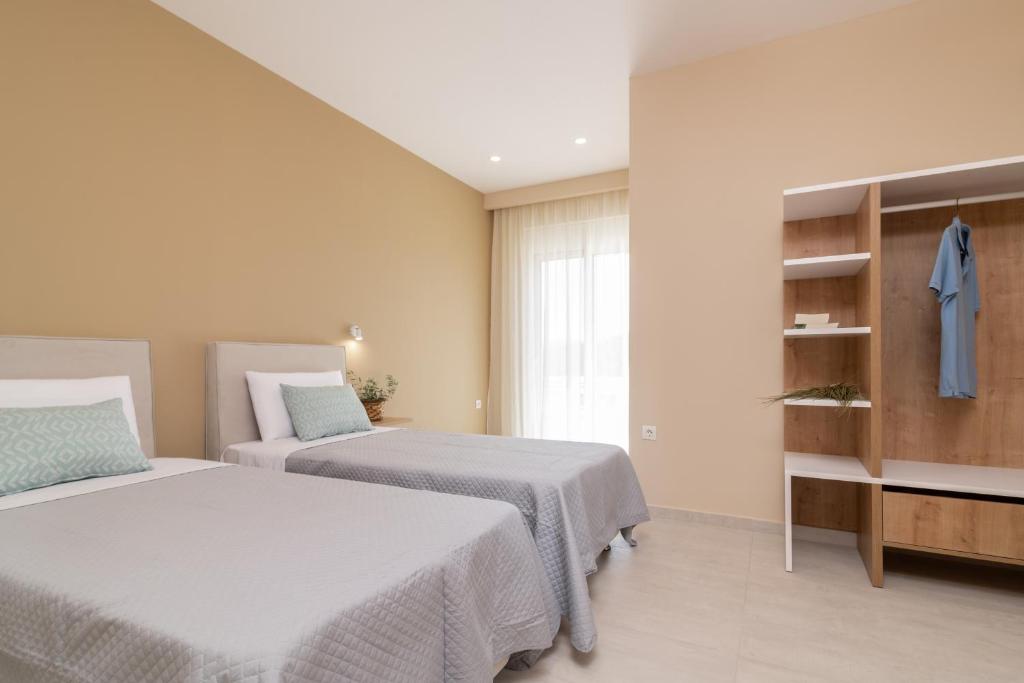 Posteľ alebo postele v izbe v ubytovaní Spartakos Luxury Villa 5