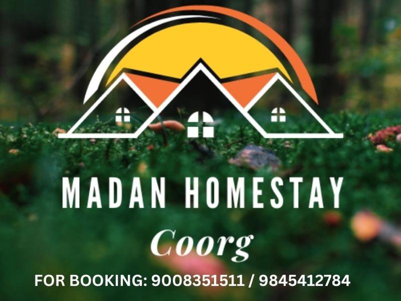 a logo for a real estate company with a house at A Madan Homestay in Napoklu