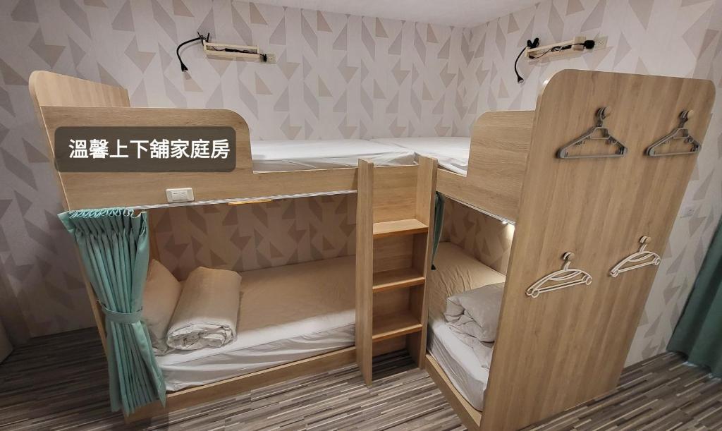 Postel nebo postele na pokoji v ubytování 寓旅宿 Apato Cityhome