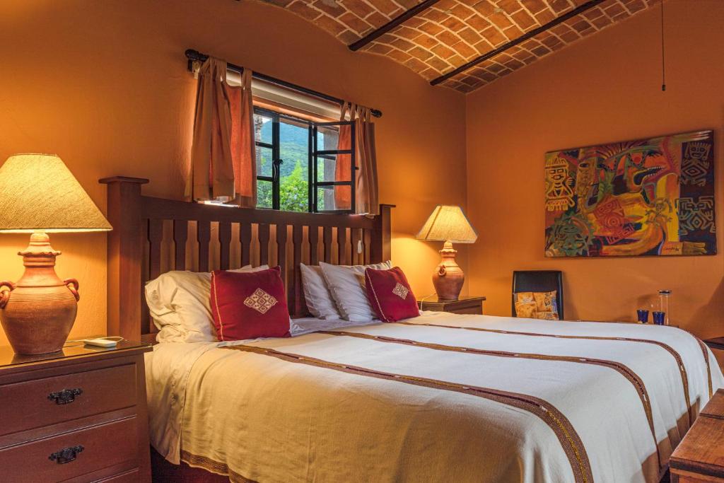 Postel nebo postele na pokoji v ubytování Casa del Sol Inn