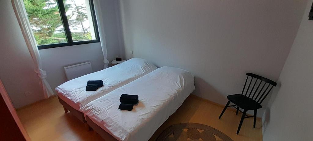 Ein Bett oder Betten in einem Zimmer der Unterkunft Maison Joli Soir à Ambleteuse