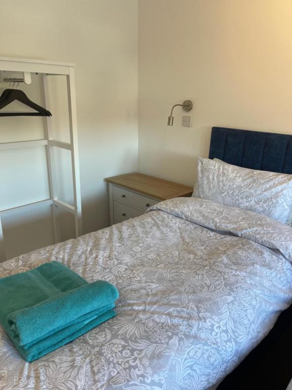Кровать или кровати в номере Jolly Sailors Retreat