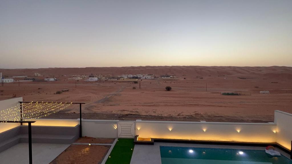 a view of the desert from the roof of a house at alsaif camp in Bidiyah
